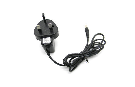 ब्रिटेन प्लग के साथ दीवार माउंट पावर एडाप्टर ओवर वोल्टेज स्विचन DC6V 500mA